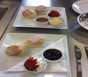 Two plates with decorative food